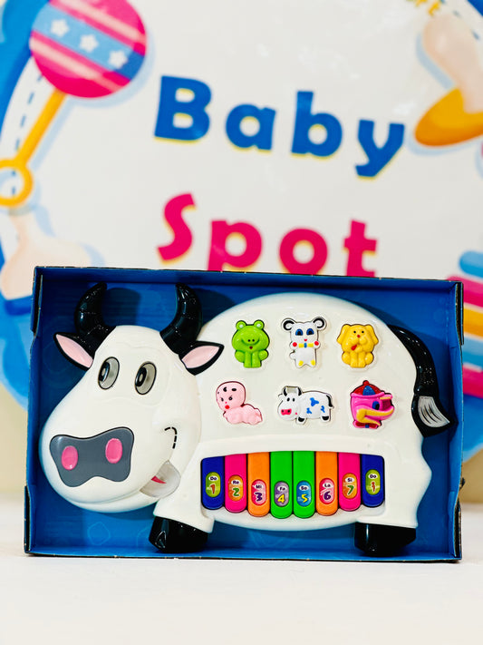 Bring joy and learning together with the Musical Cow Piano, designed to entertain and educate little musicians! This colorful and interactive toy features multiple melodies, rhymes, and fun animal sounds, making playtime more exciting. Kids can press the piano keys for different musical notes or tap the animal buttons to hear realistic animal sounds, sparking curiosity and creativity.