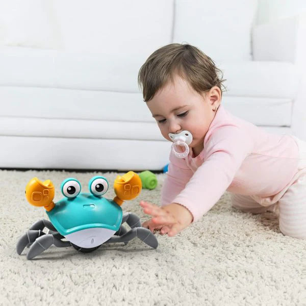 # **Dancing Crab Toy β Crawling, Musical & Full of Fun! π¦πΆ**
Watch your little one **crawl, chase, and giggle** with the **Dancing Crab Toy**! This **adorable, light-up crab** moves **flexibly in all directions**, encouraging **active play and tummy time fun**. With its **bright colors, playful music, and interactive movement**, it keeps kids **engaged and entertained** while **boosting motor skills**!
## **π Why Kids Love It?**
π¦ **Crawling Fun** β The crab **scurries around**, encouraging bab