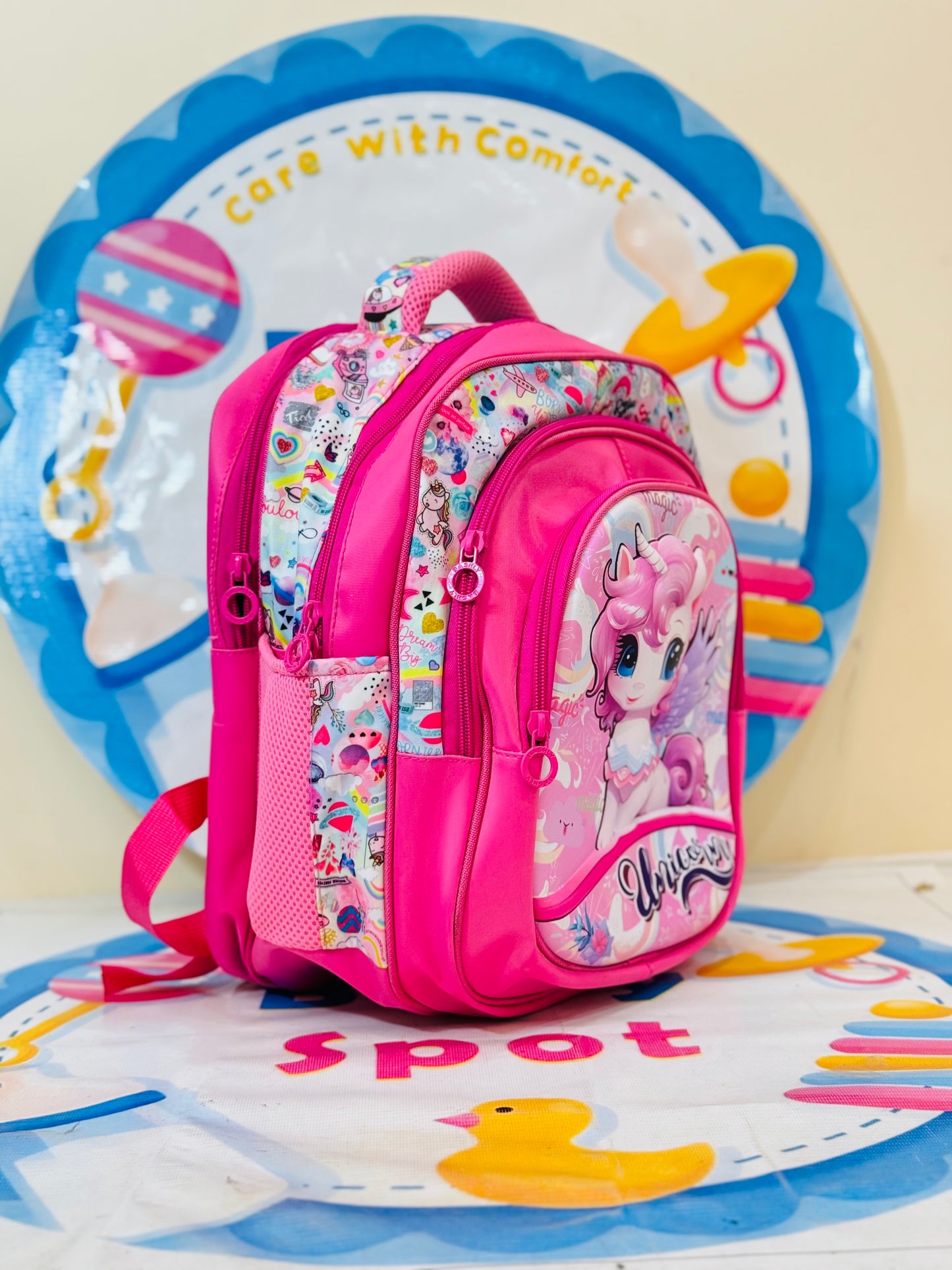 16-Inch Unicorn-Themed School Bag – Perfect for Little Dreamers on the Go! 🦄✨

Let your child step into a world of magic with this 16-inch unicorn-themed school bag! Designed for kids who love fantasy and adventure, this backpack features a spacious main compartment to store books, notebooks, and other essentials with ease. A front pocket keeps smaller items organized, while two mesh side pockets provide space for water bottles or snacks.

🌈 Why Kids Love It?
✅ Spacious & Organized – Plenty of room for sc